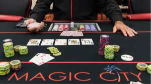 A Magic City Casino poker table point of view from a customer facing the dealer